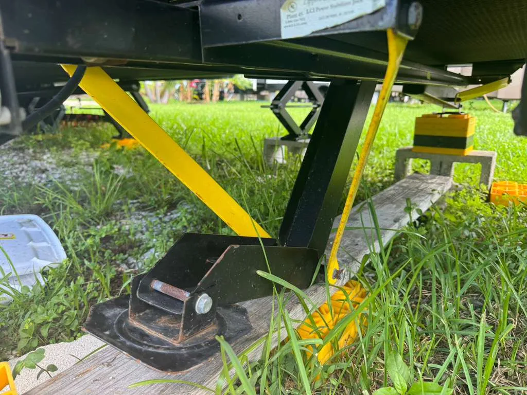 RV hydraulic leveling jacks being repaired at a Miami campground